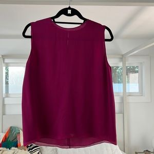 The Shelly Fuschia silk top perfect for the office or a night out.
